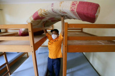 A worker prepares rooms for COVID-19 patients at Graha Wisata Ragunan in South Jakarta on Tuesday, September 29. 2020. The facility has 76 rooms that can accommodate a total of 152 patients. JP/Wendra Ajistyatama