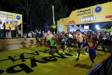 Male participants run in the Marathon open category.