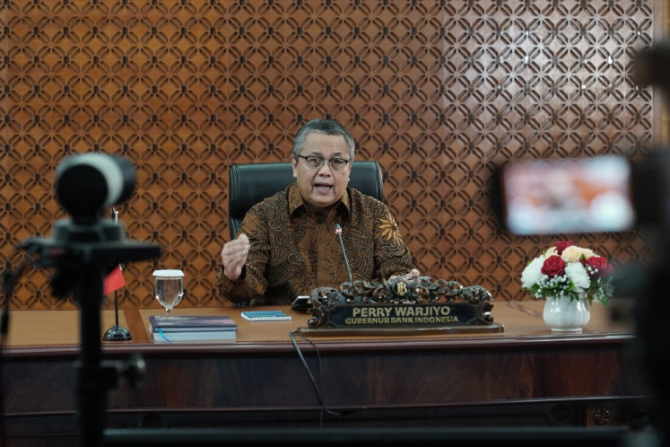 Bank Indonesia (BI) Governor Perry Warjiyo talks during a livestreamed press briefing after the monthly Board of Governors meeting in June.
