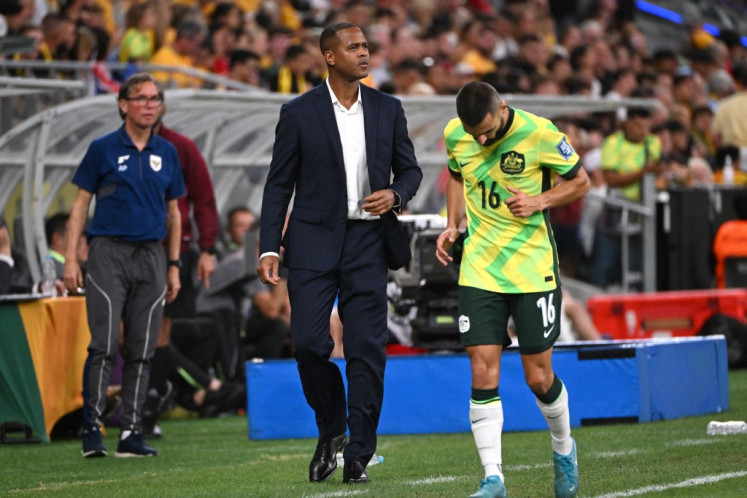 Indonesia's head coach Patrick Kluivert gives instructions on the touchline during the World Cup 2026 Asian qualifier football match between Australia and Indonesia at Allianz Stadium in Sydney on March 20, 2025. (